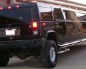 Rear photo of the black Stretch H2 Hummer